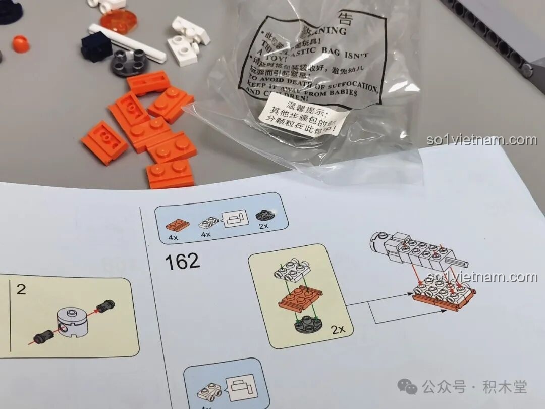 Chi tiết hướng dẫn lắp ráp các mảnh ghép nhỏ, thể hiện sự tỉ mỉ trong thiết kế của JAKI CK003 Địa cầu Bình Minh. Đồ chơi mô hình Địa cầu khám phá vũ trụ CK003 giá bình dân.