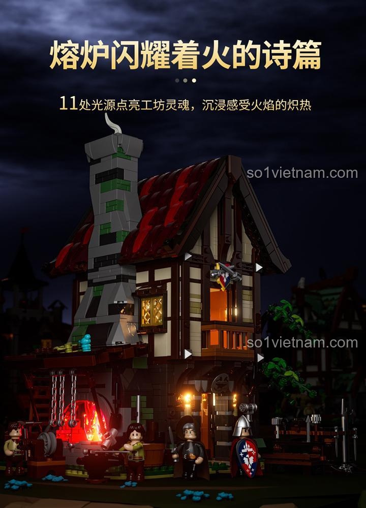 Mô hình Tòa nhà thời trung cổ có đèn F9040 về đêm, lò rèn rực sáng tạo cảm giác ấm cúng và chân thực.