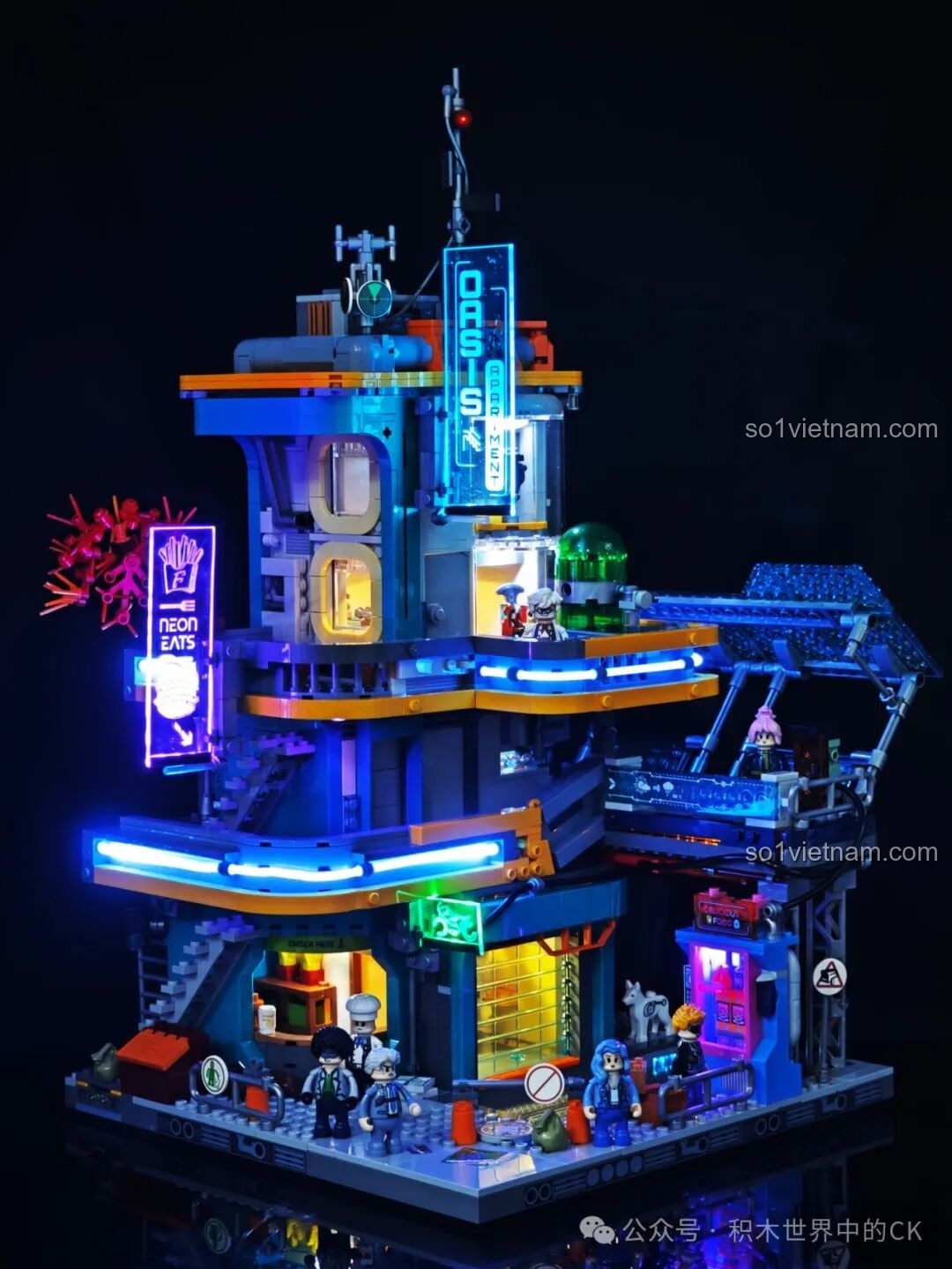 Mô hình FunWhole F9042 Tòa Nhà Căn Hộ Ốc Đảo Neon Thành Phố Cyberpunk đã hoàn thiện, rực rỡ với hệ thống đèn LED xanh tím.