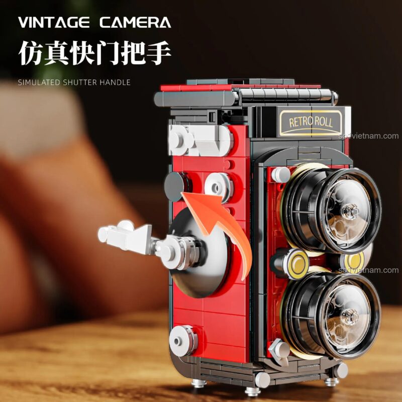 Chi tiết tay cầm chụp ảnh mô phỏng của đồ chơi mô hình Máy ảnh Vintage T2110, có thể cử động.