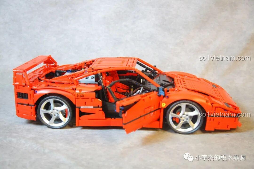 Góc nhìn chéo từ phía trước của mô hình CBOX X001 Ferrari F40, thể hiện sự hầm hố của đầu xe và sự mượt mà của thân xe.