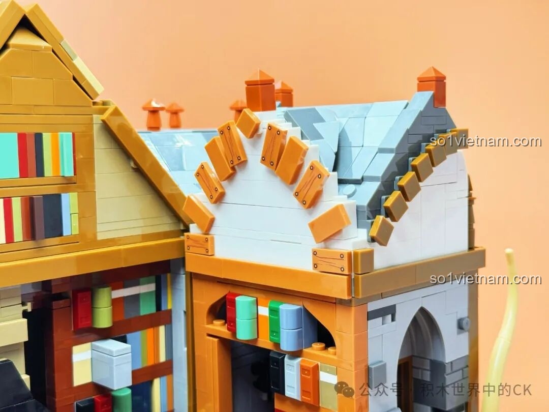 Hiệu ứng đèn LED trên các kệ sách của JIESTAR 57016 Thư viện Châu Âu, tạo điểm nhấn màu sắc.