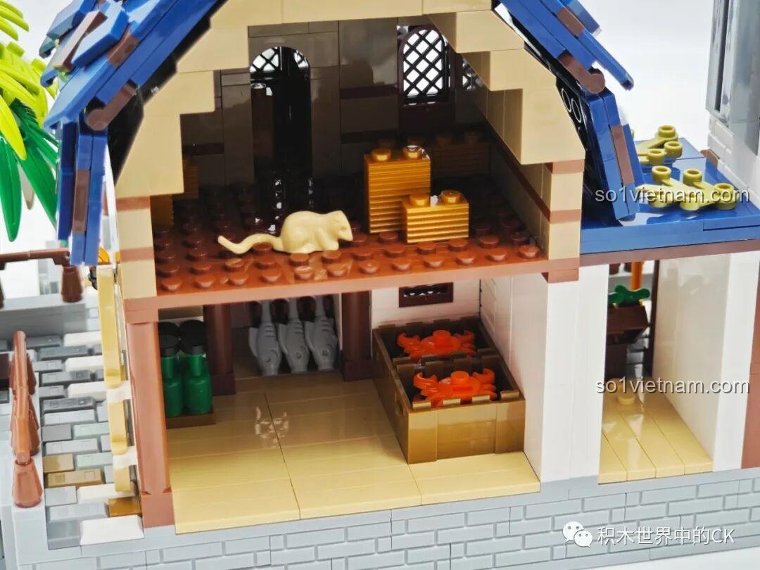 Mô hình JIESTAR 89152 Cảng Trung Cổ với hiệu ứng đèn LED lung linh vào ban đêm, tạo không khí huyền ảo.