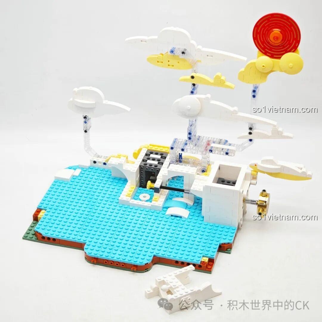 Hoàn thiện phần đế với cơ chế chuyển động và các chi tiết mây của bộ lắp ráp Rồng Vàng Keeppley K19908.