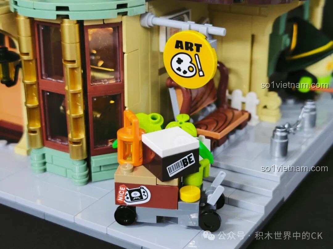 Chi tiết nhân vật BEBE Phù Thủy đứng trước cổng Học Viện Phép Thuật BEBE TOP TOY, chào đón học viên.