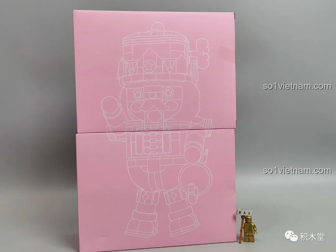 Hai hộp phụ màu hồng bên trong bộ lắp ráp Hoàng Tử Kẹp Hạt Dẻ JAKI JK8225, giúp phân loại chi tiết.