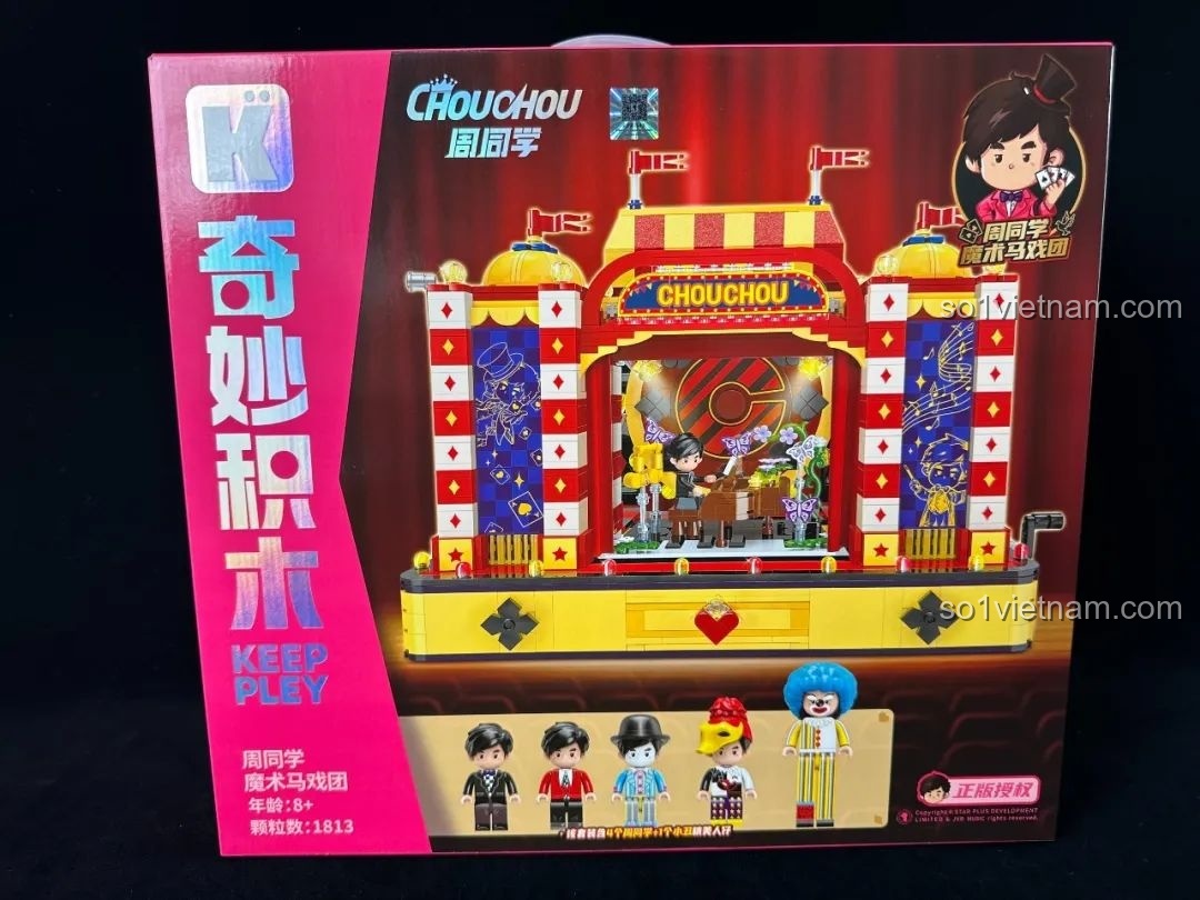 Mặt trước hộp sản phẩm Keeppley K21302 Bạn Học Châu: Rạp Xiếc Ma Thuật với màu hồng tím và hình ảnh minh họa.