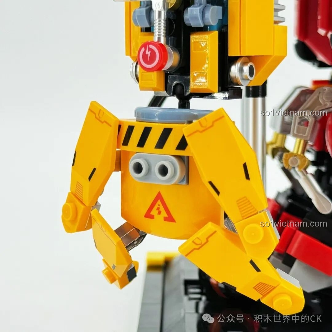 Robot Cứu Hỏa Phá Vỡ Giới Hạn iBlock ib1101 đang nâng vật nặng trong bối cảnh cháy.