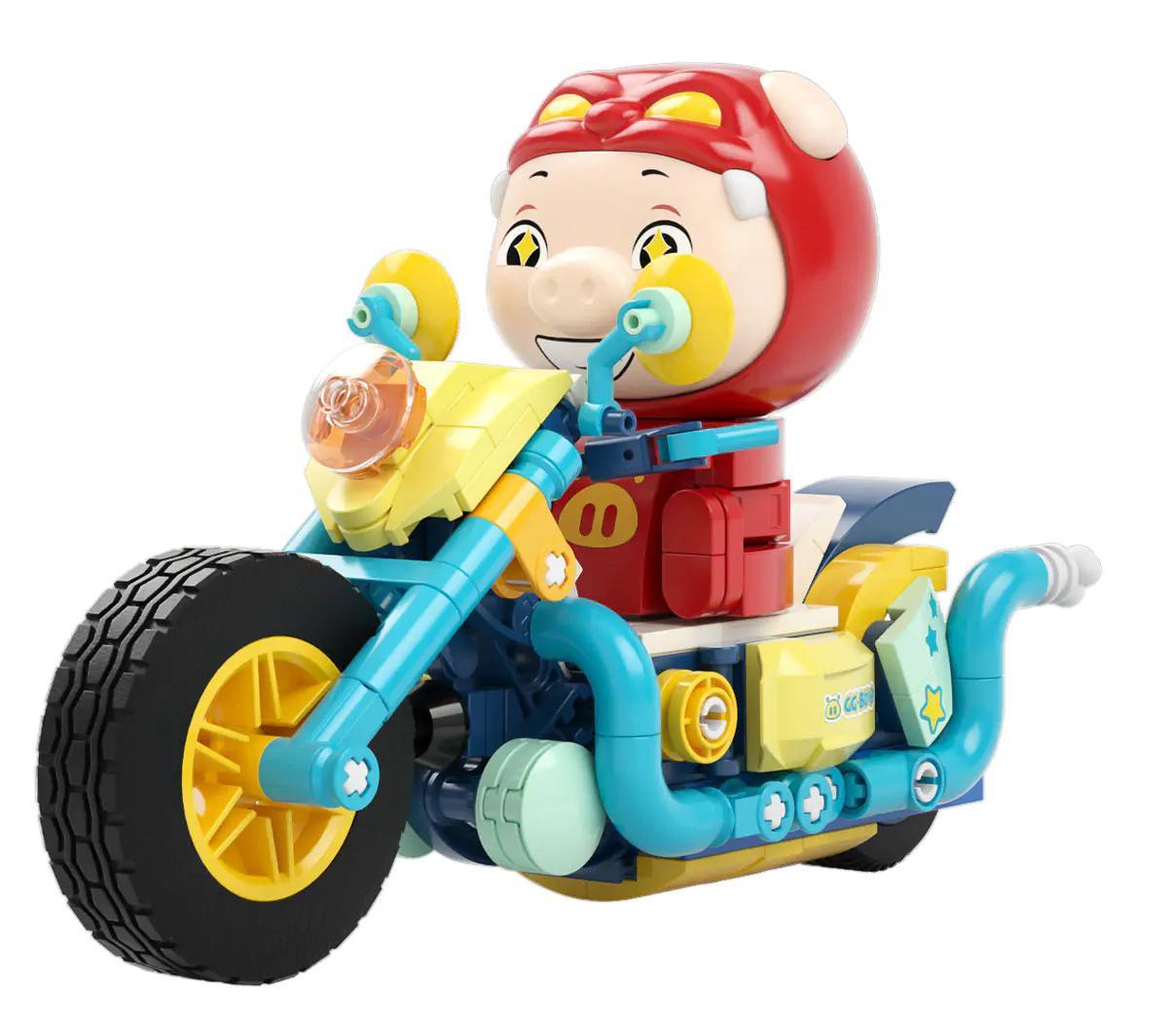 Mô hình xe máy GG Bond màu xanh vàng đỏ, có nhân vật GG Bond ngồi lái, bánh xe lớn màu đen