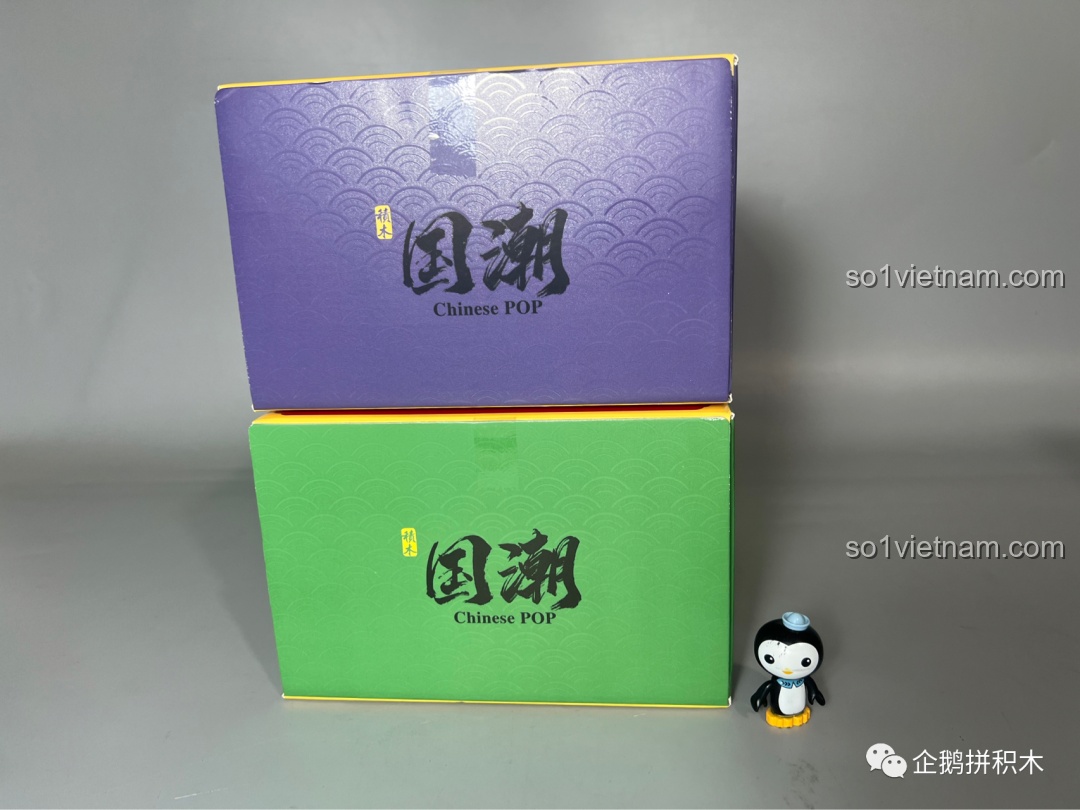 Thiết kế cạnh trên của hộp đồ chơi lắp ráp JAKI với họa tiết sóng nước và chữ 'Chinese POP' tinh tế.