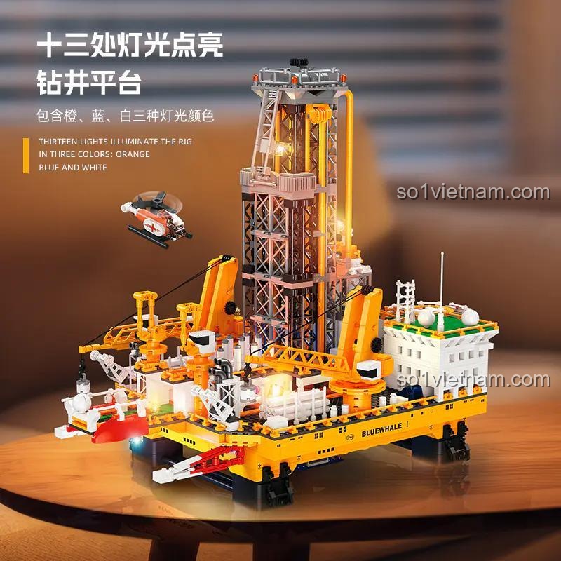 Bộ lắp ghép Giàn Khoan Dầu Khí Biển JIESTAR JJ9135 có 13 điểm đèn LED sáng rực rỡ với 3 màu cam, xanh dương, trắng.