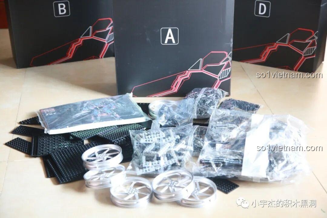 Các chi tiết bên trong hộp A của bộ K-box V5006, bao gồm sách hướng dẫn và các túi mảnh ghép.