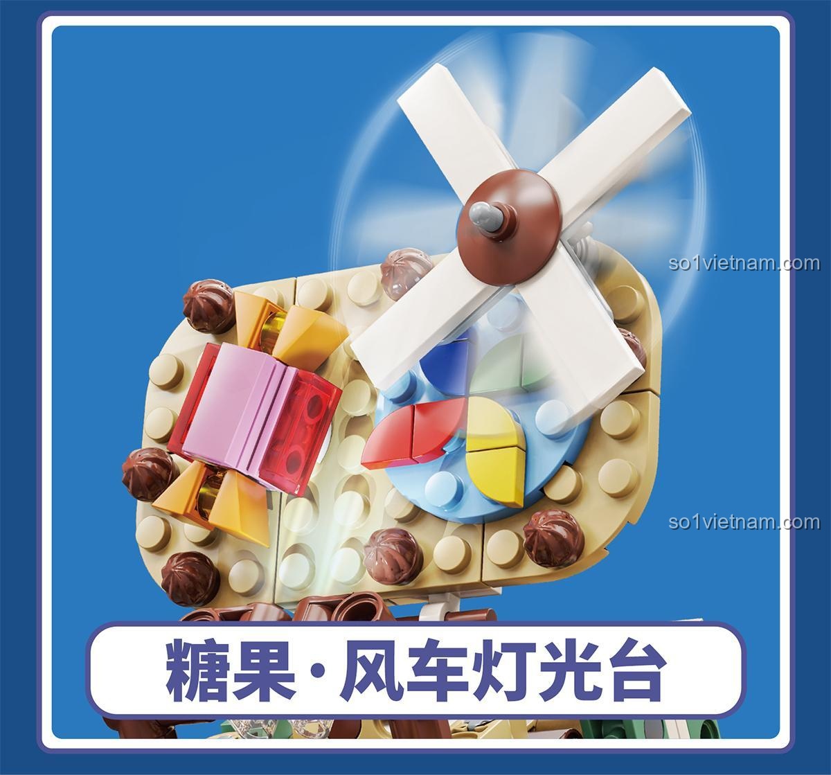 Đồ chơi xây dựng Kaido KD99003 Nhà Máy Kẹo Đầy Màu Sắc, phần trên cùng với cánh quạt và khay kẹo, thể hiện sự sáng tạo và cơ chế hoạt động, phù hợp bé 8 tuổi.