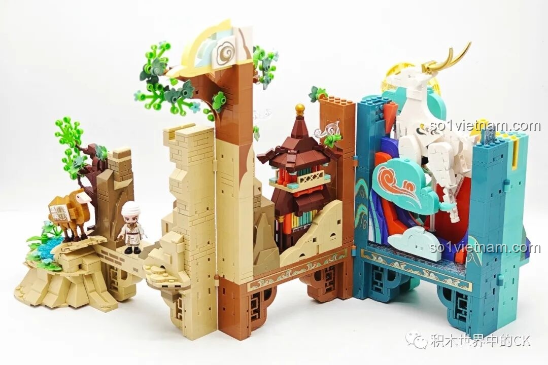 Lắp ráp phần tháp chùa và các chi tiết núi non của Keeppley K19906 Màn Hình Tranh Đôn Hoàng, tạo chiều sâu cho mô hình.