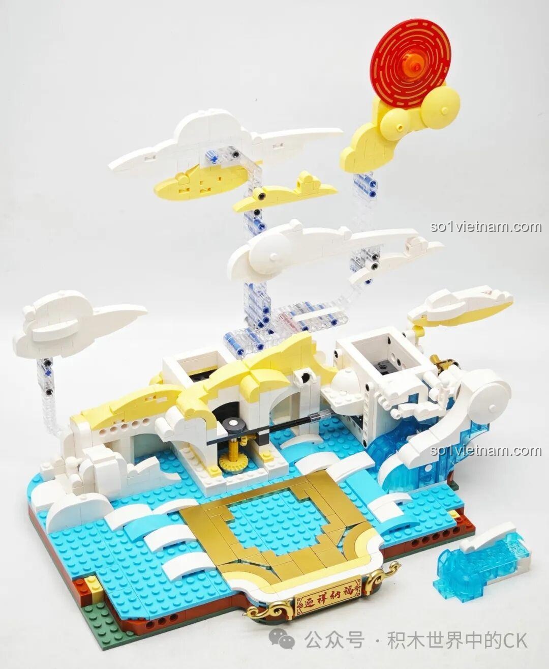 Gắn thân rồng vàng uy nghi vào phần đế đã hoàn thiện.