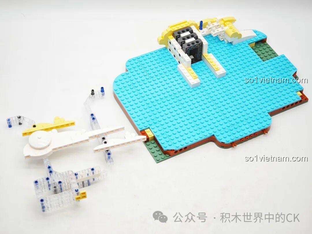 Lắp ráp các chi tiết đám mây và mặt trời cho bộ Rồng Vàng Ôm Ngọc K19908.