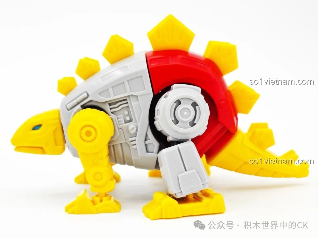Mặt lưng mô hình khủng long Snarl BLOKEES 71104 Transformers, thể hiện chi tiết gai lưng và màu sắc.