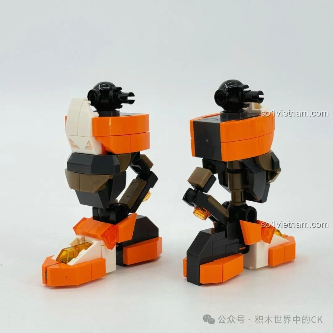 Lắp ráp phần chân của robot Ma Lễ Hải, với bàn chân to và các khớp nối chắc chắn.