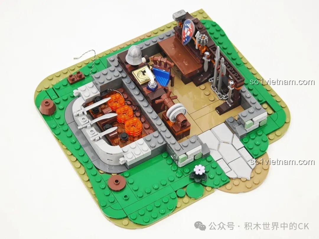 Lắp ráp các chi tiết bên trong tầng trệt của xưởng rèn Funwhole F9040, bao gồm lò nung, bàn làm việc và giá vũ khí.