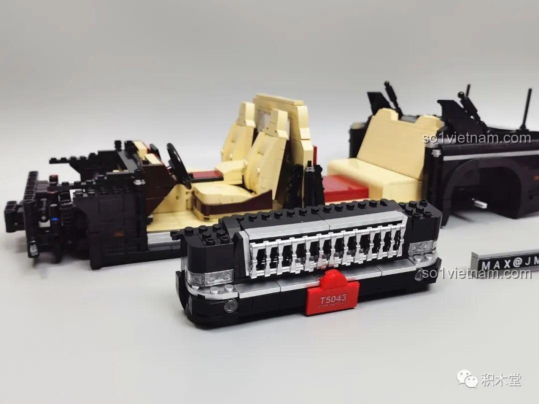 Phần đầu xe của mô hình Zhimeng Tree T5043 Xe Lễ Tân Hồng Kỳ đang được lắp ráp, với lưới tản nhiệt và đèn pha.