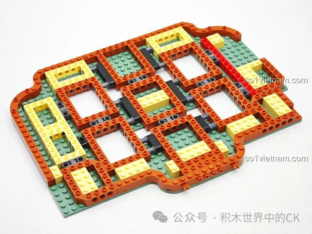 Hoàn thiện phần khung đế của bộ lắp ráp Keeppley K19908, tạo nền móng vững chắc cho Rồng Vàng.