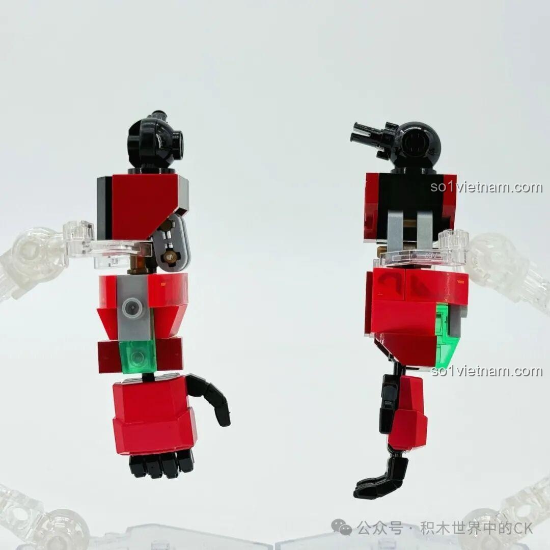 Lắp ráp phần tay của robot Ma Lễ Thọ, với các khớp nối linh hoạt và màu sắc hài hòa.