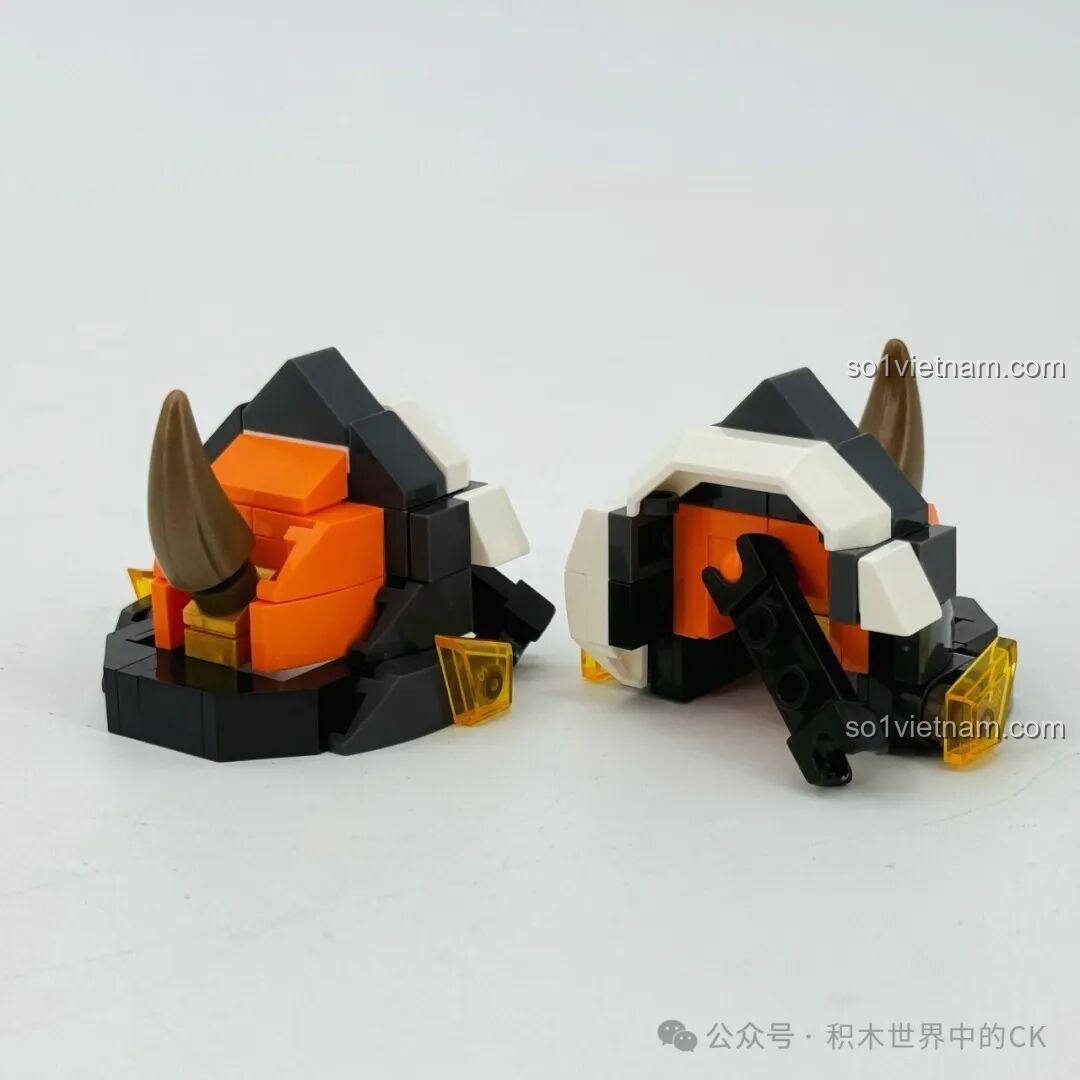 Lắp ráp phần giáp vai của robot Ma Lễ Hải, có hình dạng giống sừng tê giác, tạo vẻ ngoài hầm hố.