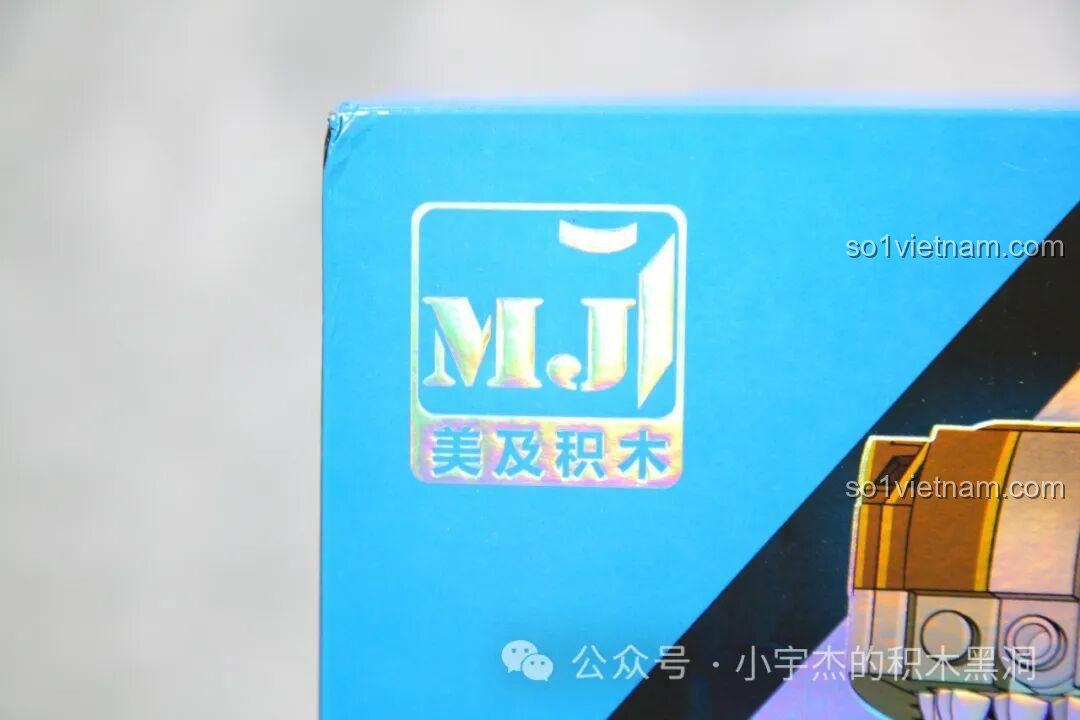 Logo của hãng MJ (Meiji Blocks) trên hộp đồ chơi mô hình Robot Khủng long T-Rex 13050.