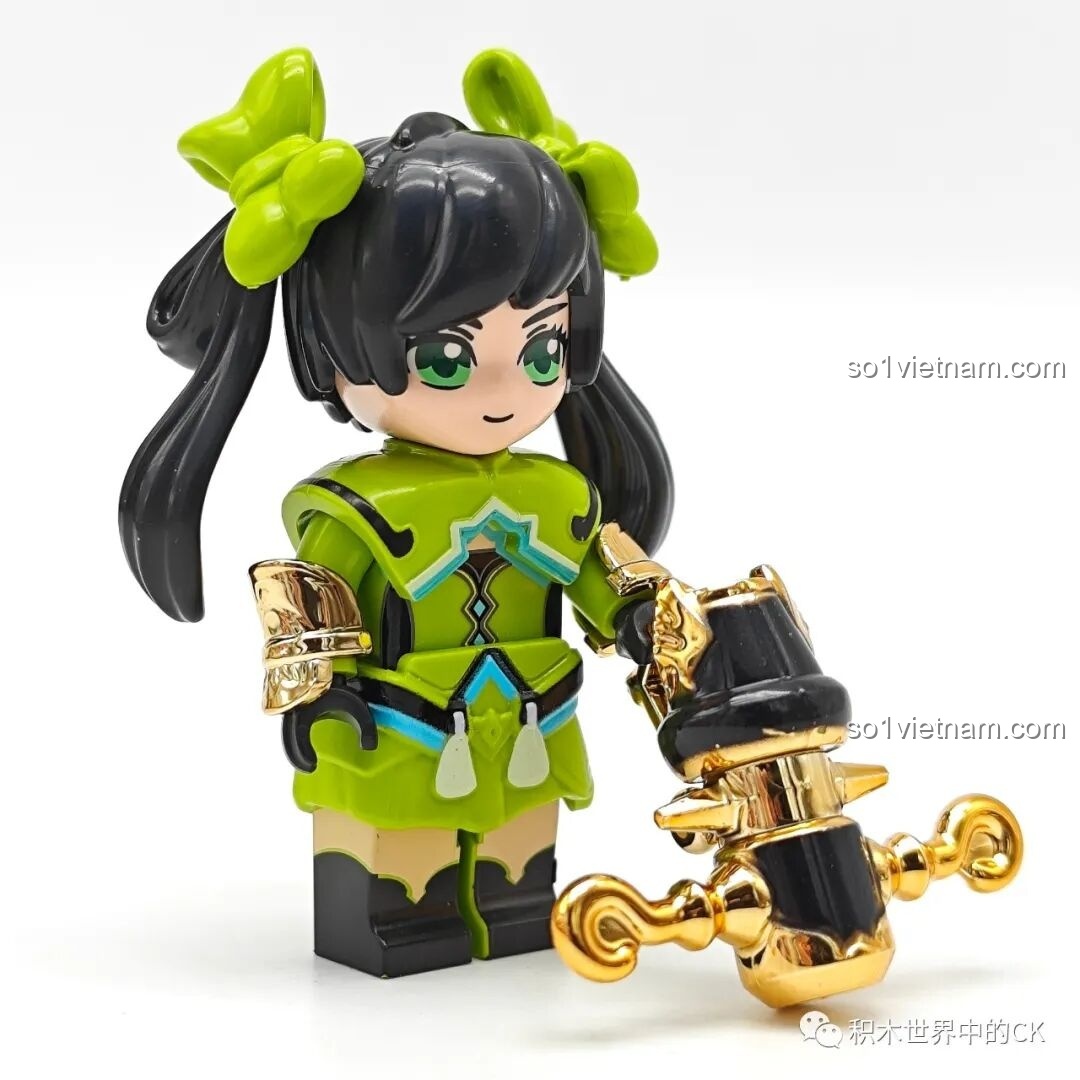 Minifigure Tôn Thượng Hương tinh nghịch trong bộ Qman 78002, cầm khẩu pháo vàng, một món đồ chơi mô hình lý tưởng cho bé gái.