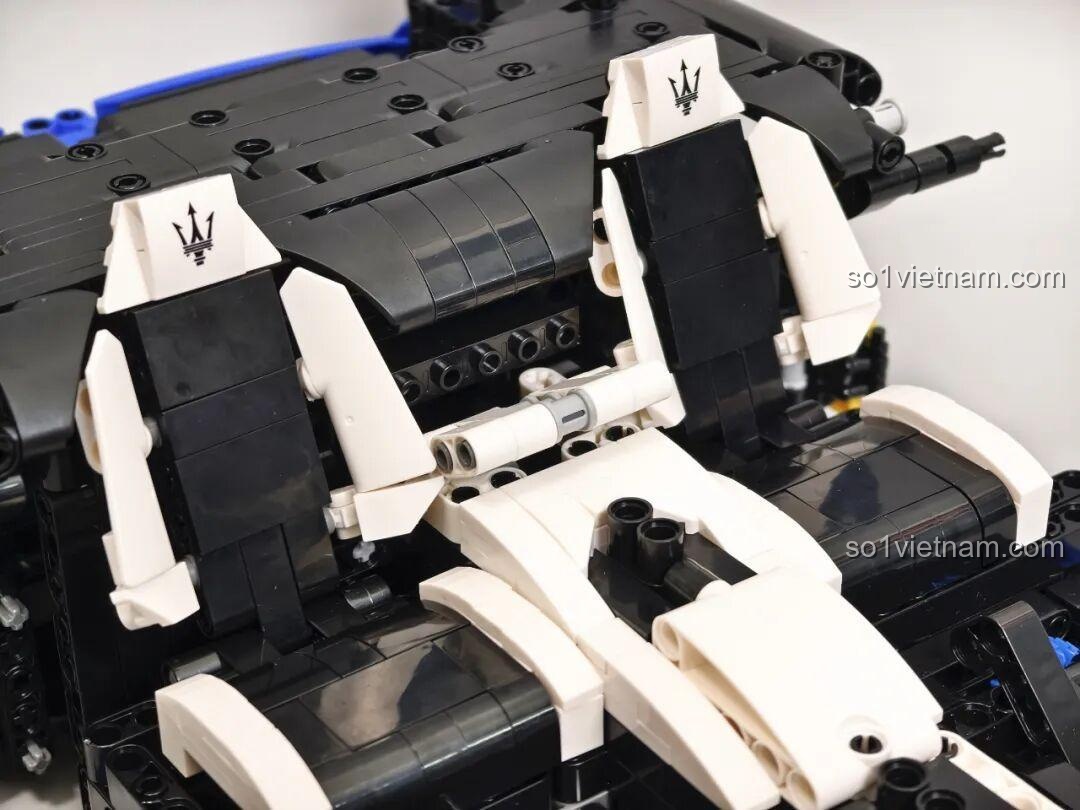 Mô hình hoàn chỉnh Reobrix 11010 Maserati GranTurismo 1:8 nhìn từ bên hông, đường nét mượt mà.