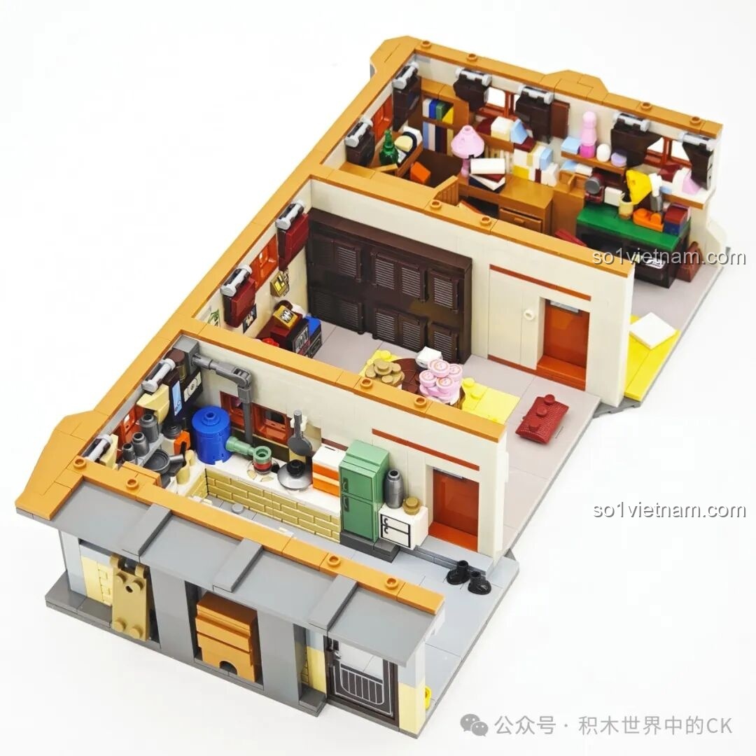 Ảnh chụp mô hình nhà Deok-sun từ góc nhìn chéo bên trái, tập trung vào khu vực bếp và lối vào chính của căn nhà.