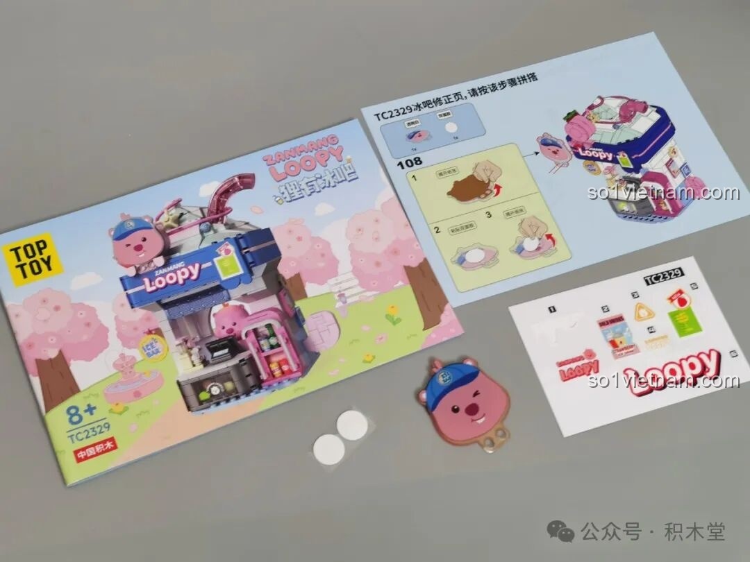 Mở hộp bộ xếp hình Quầy bar kem Loopy TOP TOY với các túi mảnh ghép và sách hướng dẫn.
