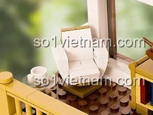 Ghế xoay và bàn trà trong mô hình nhà gỗ Pantasy 85003, nội thất chi tiết, mang lại không gian yên bình