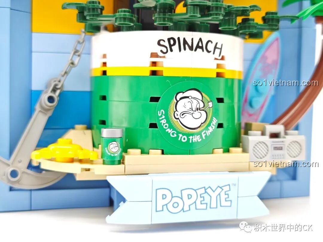 Chi tiết phần đế hộp rau chân vịt và các phụ kiện bãi biển của Tranh Lắp Ráp 3D Popeye.