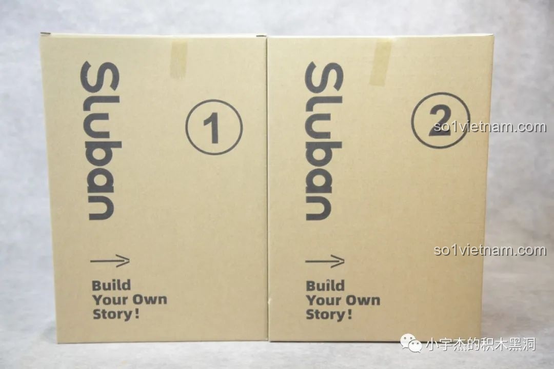 Hai hộp nhỏ được đánh số 1 và 2 bên trong bộ lắp ghép Sluban J-20 M38-B1187 Tiêm Kích Tàng Hình, giúp phân loại chi tiết dễ dàng.