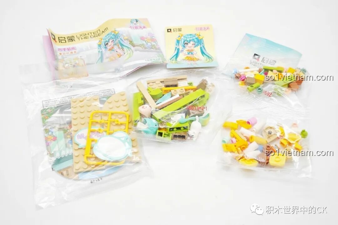 Bộ lắp ghép Hatsune Miku: Các mảnh ghép của mô hình Trà Chanh Mát Lạnh, với màu vàng và xanh lá tươi sáng.