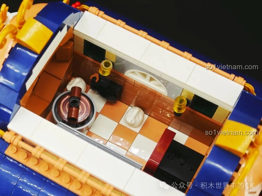 Cận cảnh tủ trưng bày bánh donut trong BAKA 33202 Xưởng Bánh Donut, với nhiều loại bánh hấp dẫn.