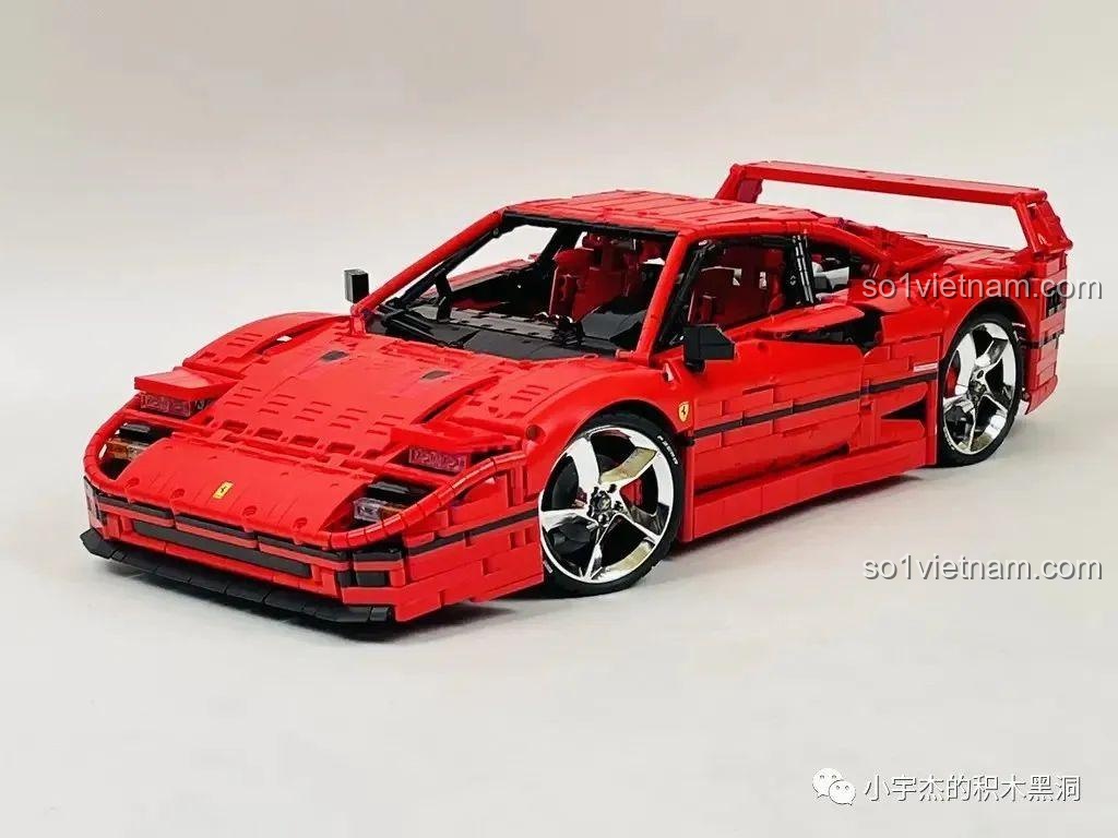 Mô hình CBOX X001 Siêu xe Ferrari F40 hoàn thiện với màu đỏ rực rỡ, bánh xe bạc và các chi tiết sắc nét, sẵn sàng để trưng bày.