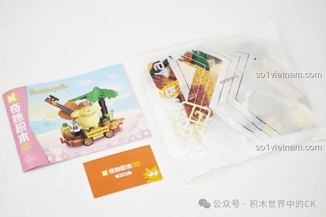 Mô hình lắp ghép Pompompurin K20833 đã hoàn thành, xe hoa chủ đề bãi biển với cây cọ, đàn guitar và nước dứa.