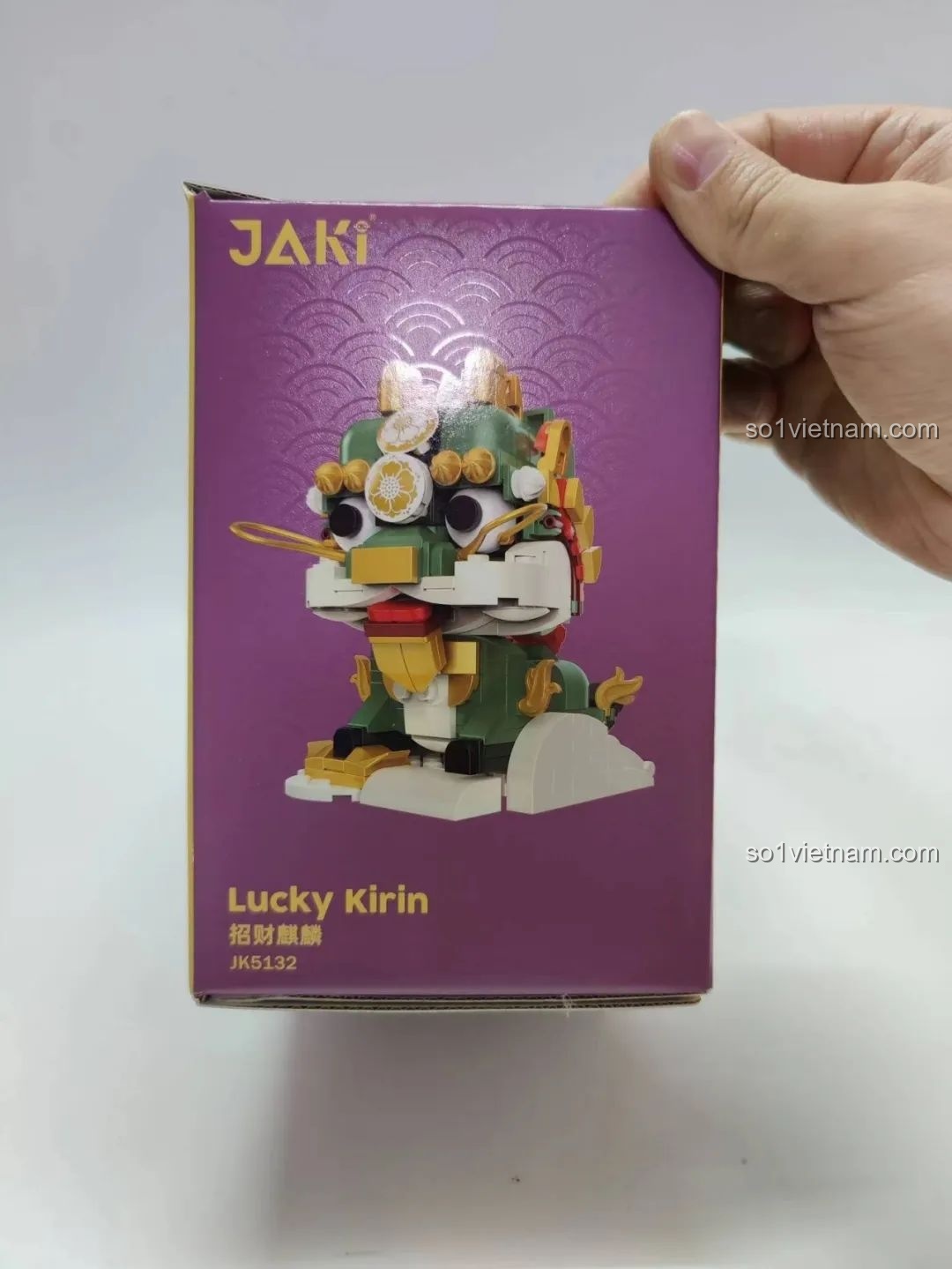 Mặt bên hộp đồ chơi lắp ráp Kỳ Lân Chiêu Tài JK5132 JAKI, thể hiện họa tiết mây lành truyền thống.