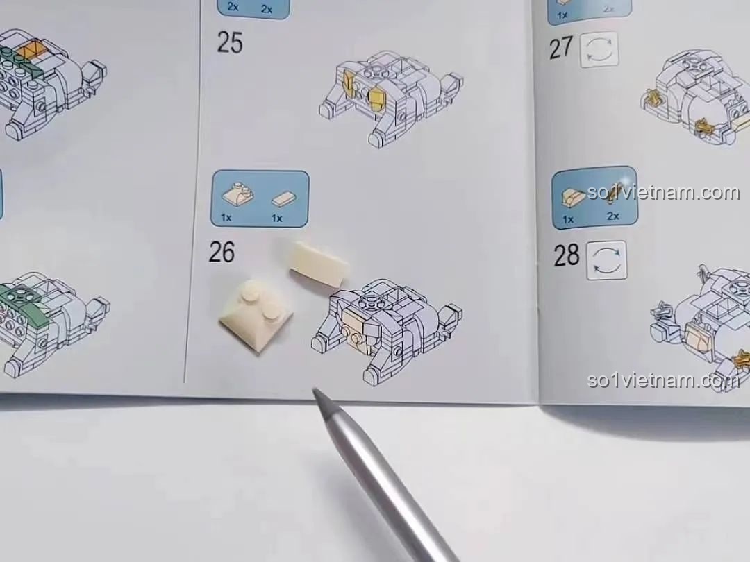 So sánh màu sắc mảnh ghép thực tế và hình ảnh trong sách hướng dẫn Kỳ Lân Chiêu Tài JK5132 JAKI.