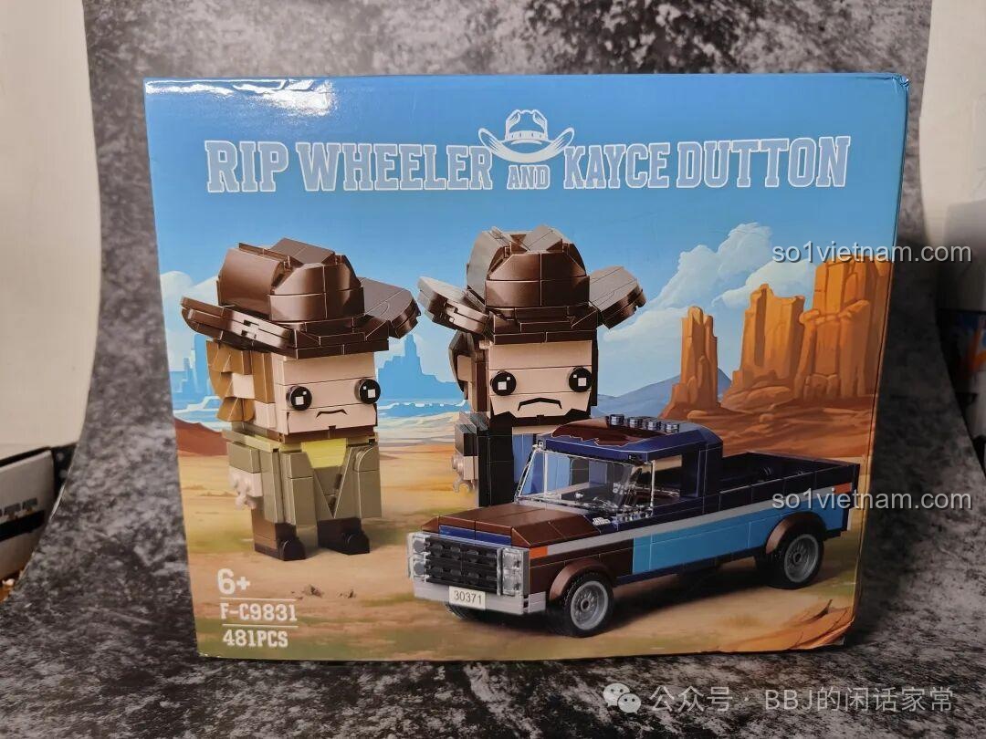 Hộp bộ lắp ghép Millionspring F-C9831 Yellowstone: Rip Wheeler và Kayce Dutton với hình ảnh nhân vật và xe bán tải.