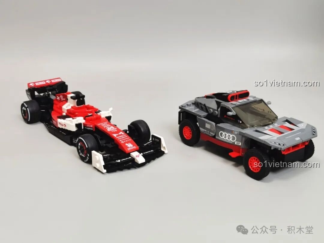 Mô hình RASTAR 10120 Audi RS Q e-tron E2 và xe F1 từ góc nhìn khác, làm nổi bật sự đa dạng của các dòng xe RASTAR.
