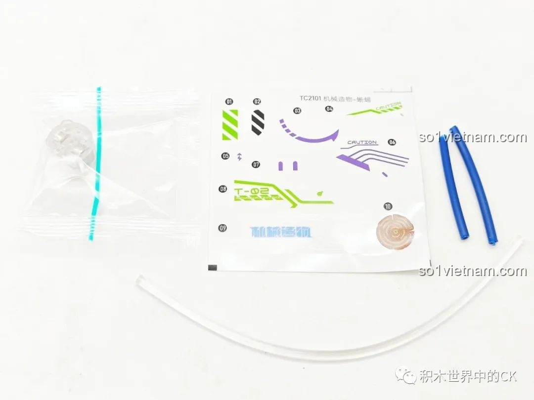 Miếng dán decal và các ống dẫn màu sắc đi kèm bộ lắp ráp TOP TOY TC2101 Tắc Kè Hoa Robot.