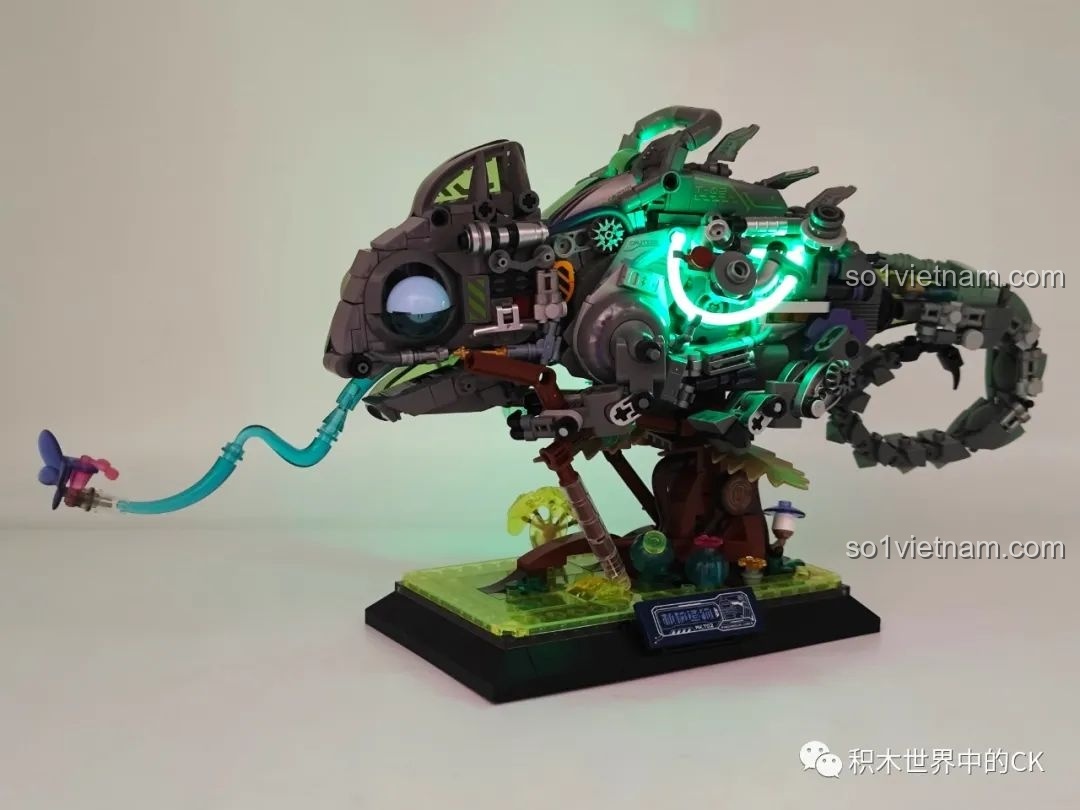 Cận cảnh mô hình Biến Thể Cơ Khí Tắc Kè Hoa Neon TC2101 với đèn LED sáng rõ, tạo hiệu ứng huyền ảo.