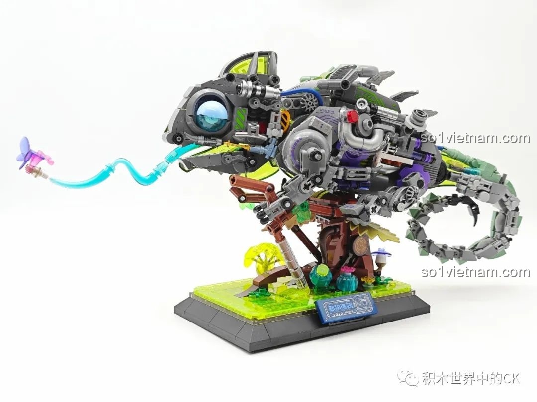 Mô hình hoàn chỉnh TOP TOY TC2101 Biến Thể Cơ Khí Tắc Kè Hoa Neon đứng trên bệ đỡ, chưa bật đèn.