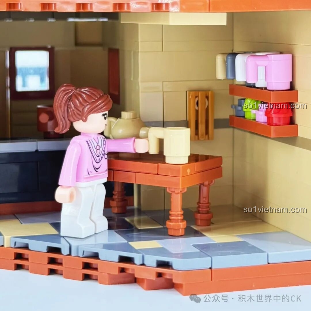 Minifigure đang vẽ tranh ở sân sau của Học viện Pháp thuật ZHEGAO 613004 dưới ánh đèn LED, tạo không gian sáng tạo.