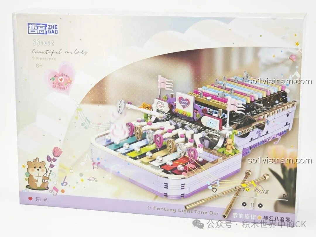 Hộp sản phẩm Đàn Tám Âm Mộng Ảo ZHEGAO 991014 với thiết kế màu pastel dễ thương, hình ảnh cây đàn gõ và các chi tiết trang trí sinh động, thu hút bé gái.