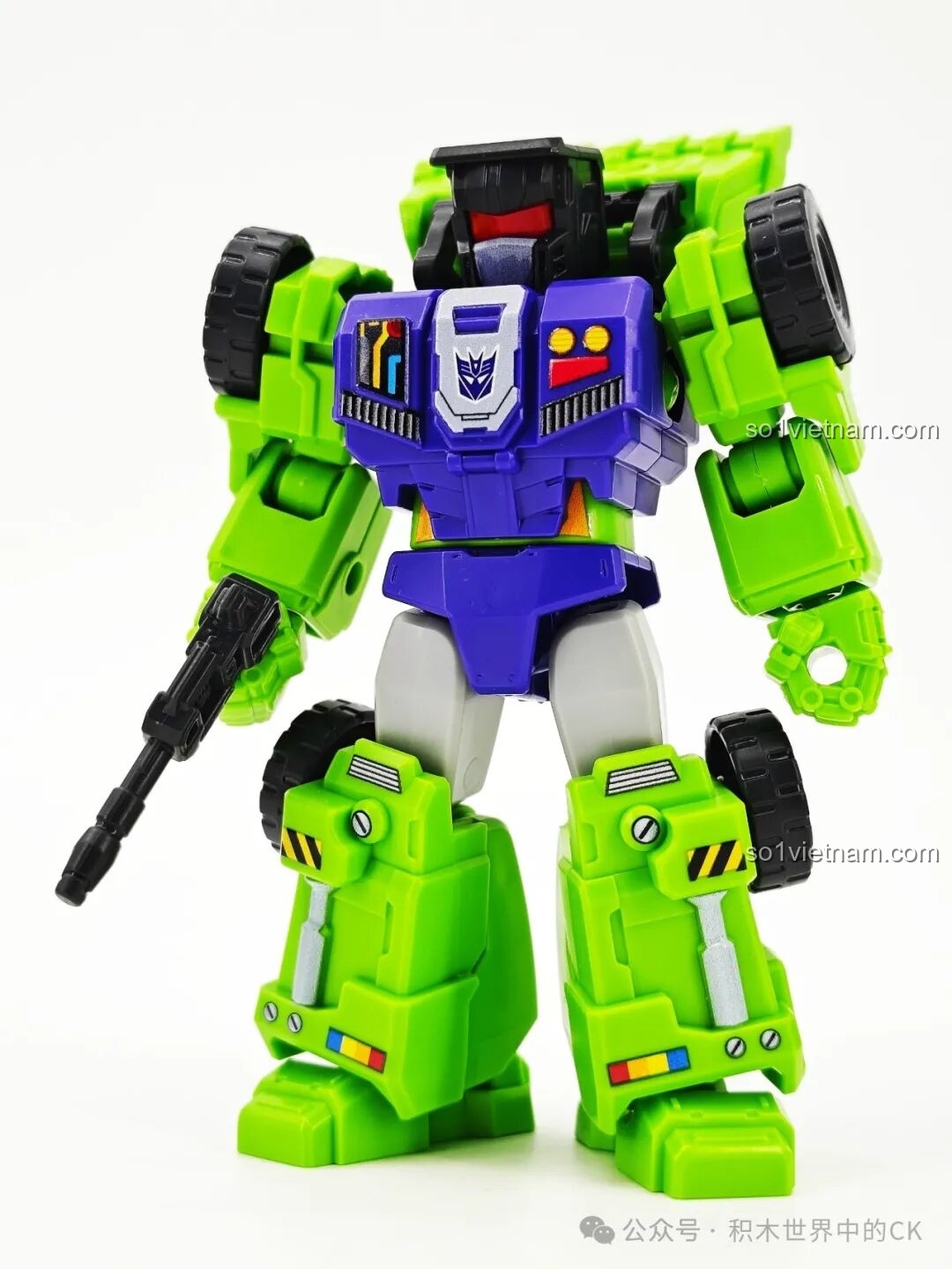 Mô hình robot Bonecrusher từ bộ lắp ghép BLOKEES 71104 Transformers Galaxy Version 4th Wave, với màu xanh lá và tím.