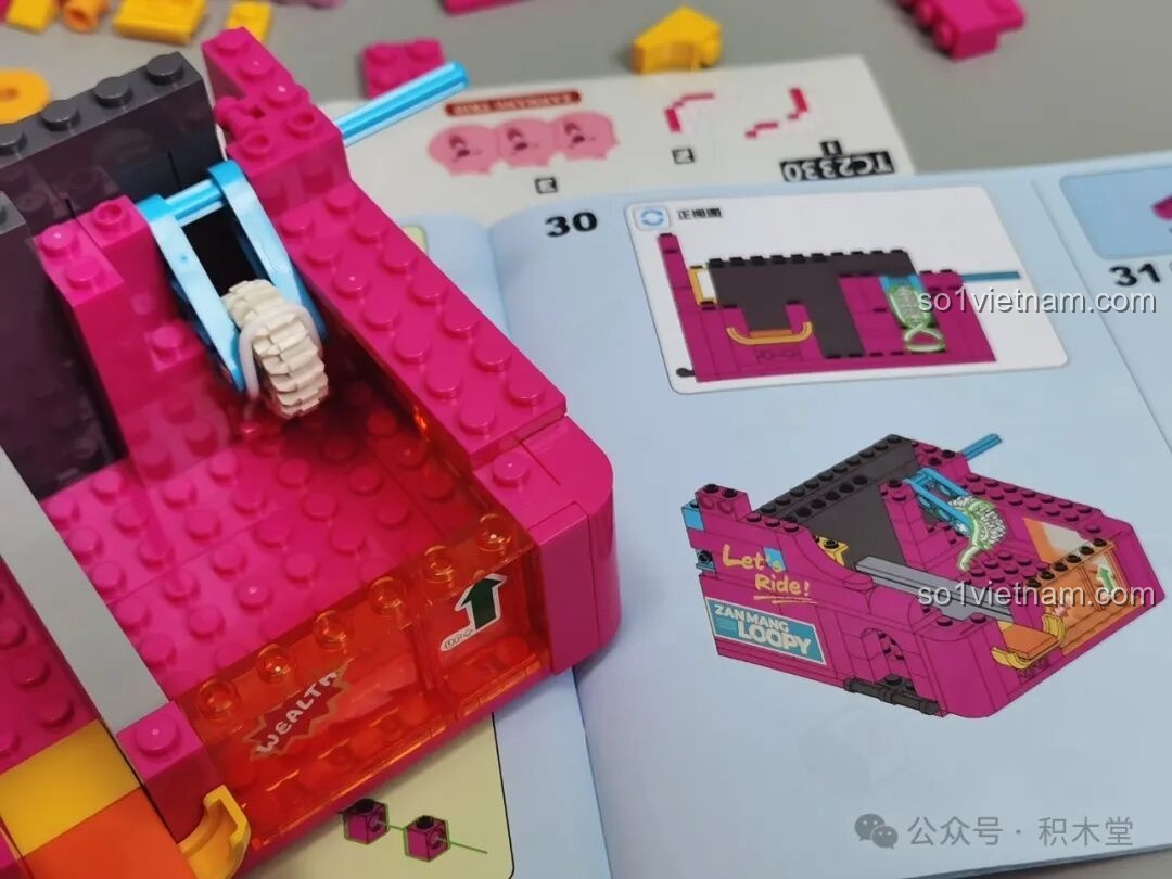 Sách hướng dẫn và các tờ sticker trang trí của bộ lắp ráp Máy Gắp Thưởng Loopy TC2330.